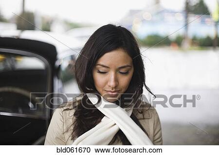 Stock Image - Middle Eastern woman wearing scarf. Fotosearch