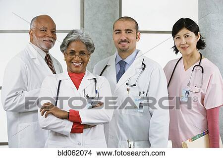 Picture - Multi-ethnic doctors and nurse posing. Fotosearch