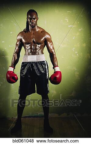 Stock Photo - Portrait of African male boxer. Fotosearch