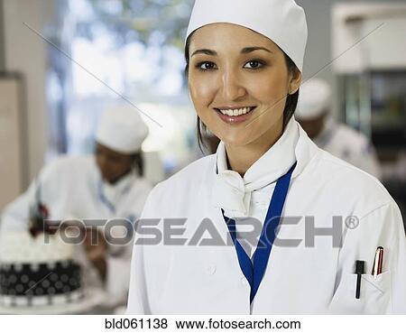 Stock Photo - Portrait of Asian female chef. Fotosearch