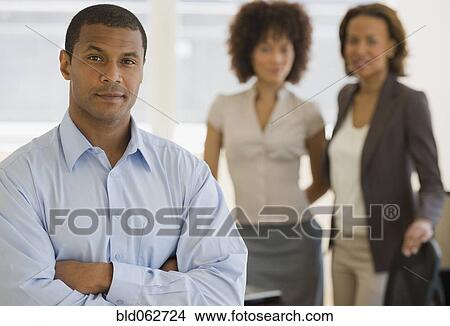 Picture - African business people looking confident. Fotosearch