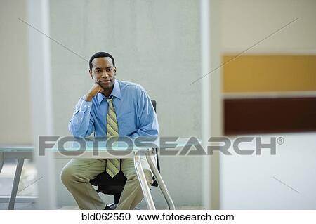 Stock Image - African businessman in office. Fotosearch