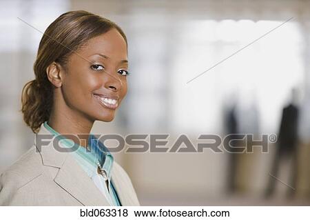 Stock Photo - African businesswoman looking confident. Fotosearch