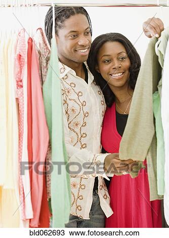 Stock Image - African couple shopping. Fotosearch