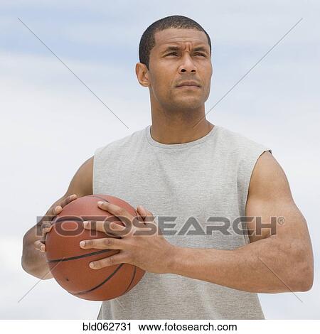 African man playing basketball View Large Photo Image Stock Image - African man playing basketball. Fotosearch