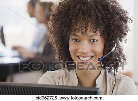 African woman wearing headset View Large Photo Image Stock Photography - African woman wearing headset. Fotosearch