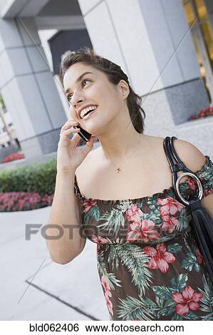Brazilian teenager talking on cell phone View Large Photo Image Stock Photograph - Brazilian teenager talking on cell phone. Fotosearch