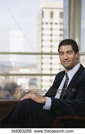 Stock Photo - Businessman smiling. Fotosearch