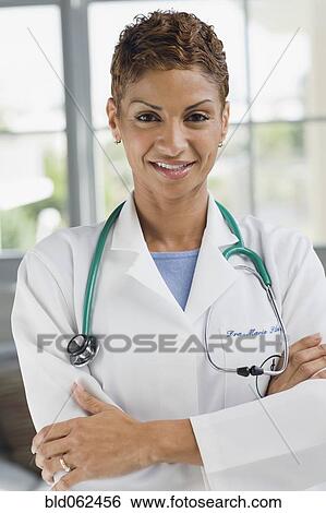 Stock Photograph - Cape Verde doctor in lab coat. Fotosearch