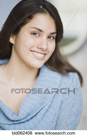 Stock Photo - Close of up Brazilian teenager smiling. Fotosearch