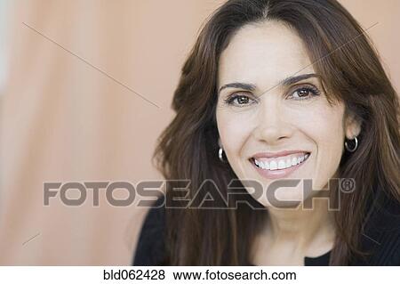 Close up of mixed race woman smiling View Large Photo Image Stock Photo - Close up of mixed race woman smiling. Fotosearch