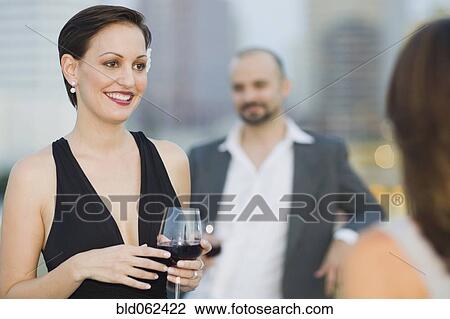 Cuban woman holding wine glass View Large Photo Image Stock Image - Cuban woman holding wine glass. Fotosearch