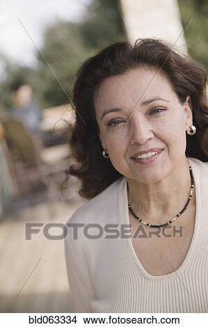 Picture - Hispanic woman smiling. Fotosearch