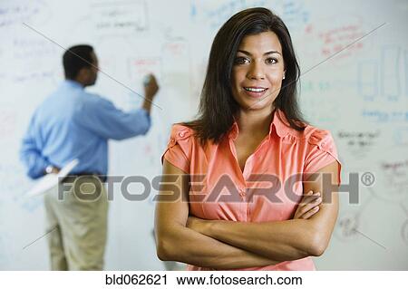 Indian businesswoman with arms crossed View Large Photo Image Stock Image - Indian businesswoman with arms crossed. Fotosearch
