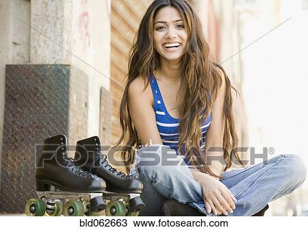 Middle Eastern woman with roller skates View Large Photo Image Stock Image - Middle Eastern woman with roller skates. Fotosearch