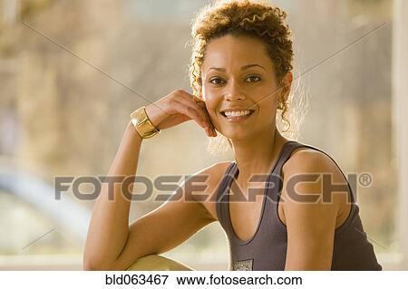 Mixed race woman smiling View Large Photo Image Stock Photo - Mixed race woman smiling. Fotosearch