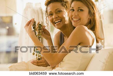 Multi-ethnic women jewelry shopping View Large Photo Image Stock Photo - Multi-ethnic women jewelry shopping. Fotosearch