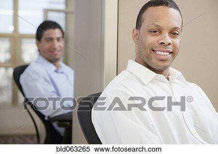 Two businessmen smiling View Large Photo Image Stock Photography - Two businessmen smiling. Fotosearch