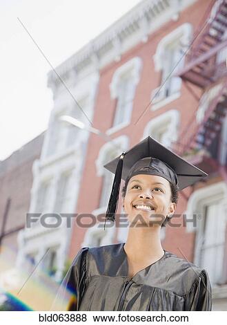 African woman in graduation cap and gown View Large Photo Image Stock Photo - African woman in graduation cap and gown. Fotosearch