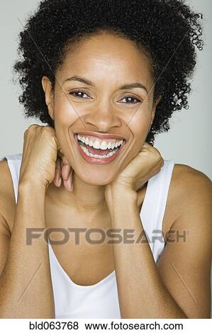 Stock Photo - African woman laughing. Fotosearch