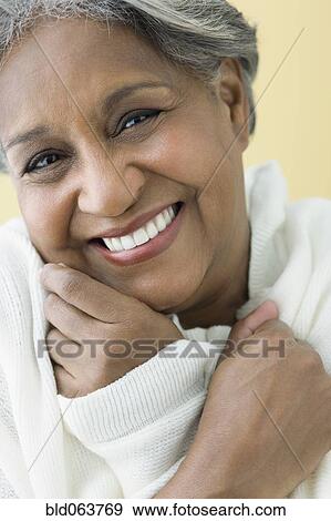 Stock Photo - African woman wrapped in shawl. Fotosearch