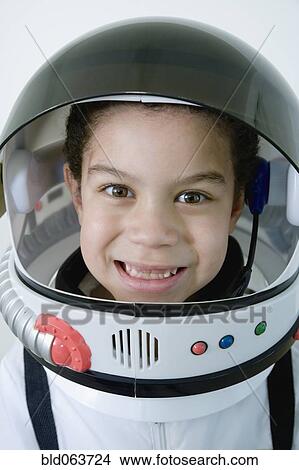 Mixed race boy in astronaut costume View Large Photo Image Picture - Mixed race boy in astronaut costume. Fotosearch