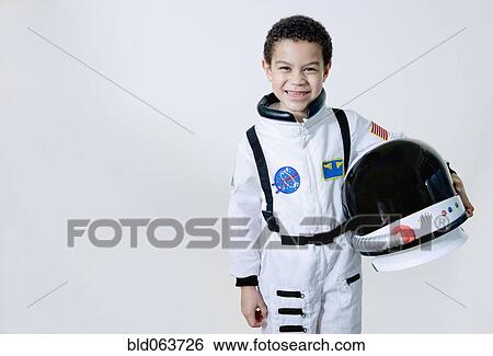 Mixed race boy in astronaut costume View Large Photo Image Stock Photograph - Mixed race boy in astronaut costume. Fotosearch