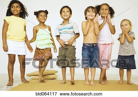 Stock Photo - Multi-ethnic children looking excited. Fotosearch