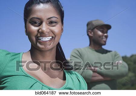 Stock Photo - Multi-ethnic couple outdoors. Fotosearch