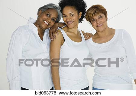 Multi-ethnic friends smiling View Large Photo Image Stock Photo - Multi-ethnic friends smiling. Fotosearch
