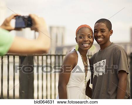African brother and sister posing for photograph View Large Photo Image Stock Image - African brother and sister posing for photograph. Fotosearch