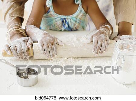 African grandmother baking with granddaughter View Large Photo Image Stock Photo - African grandmother baking with granddaughter. Fotosearch