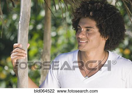 African man standing in shade View Large Photo Image Stock Image - African man standing in shade. Fotosearch