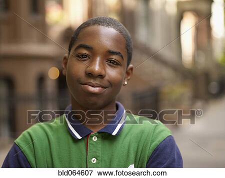 Stock Photo - African teenage boy smiling. Fotosearch