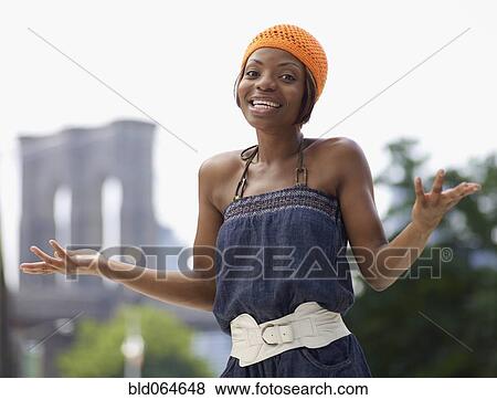 African woman gesturing questioningly in urban setting View Large Photo Image Stock Photo - African woman gesturing questioningly in urban setting. Fotosearch