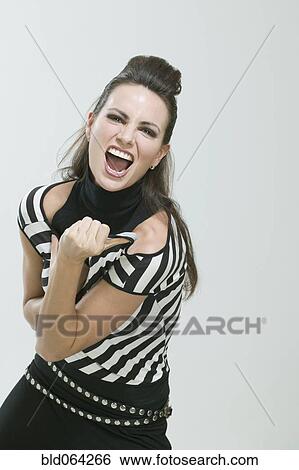 Angry Hispanic woman shouting View Large Photo Image Stock Photograph - Angry Hispanic woman shouting. Fotosearch