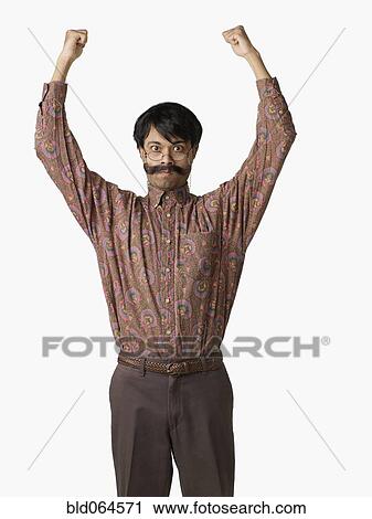 Angry Indian man with arms raised View Large Photo Image Stock Image - Angry Indian man with arms raised. Fotosearch