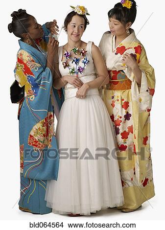 Asian bride with bridesmaids in traditional clothing View Large Photo Image Picture - Asian bride with bridesmaids in traditional clothing. Fotosearch