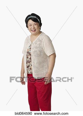 Confident Asian woman smiling View Large Photo Image Stock Image - Confident Asian woman smiling. Fotosearch
