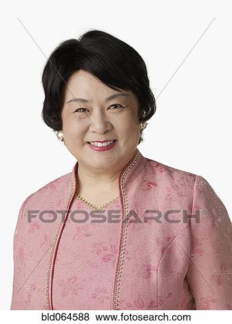 Stock Photo - Confident Asian woman smiling. Fotosearch