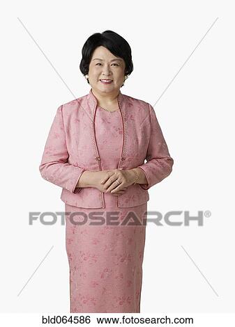 Stock Photograph - Confident Asian woman smiling. Fotosearch