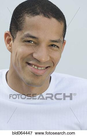 Confident Hispanic man smiling View Large Photo Image Stock Photo - Confident Hispanic man smiling. Fotosearch