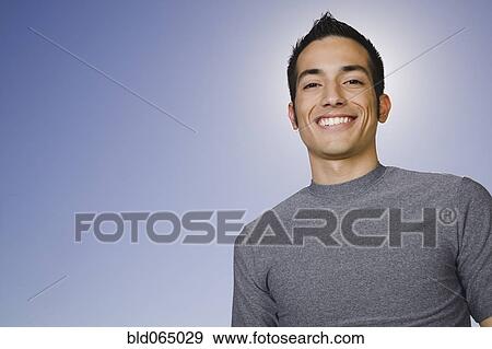Confident Hispanic man smiling View Large Photo Image Stock Photo - Confident Hispanic man smiling. Fotosearch
