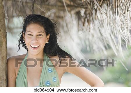 Confident Hispanic woman smiling View Large Photo Image Picture - Confident Hispanic woman smiling. Fotosearch