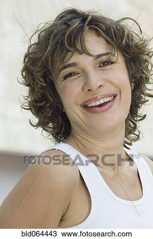 Confident Hispanic woman smiling View Large Photo Image Stock Image - Confident Hispanic woman smiling. Fotosearch