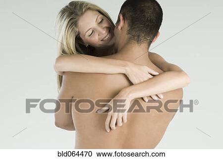 Hispanic couple hugging View Large Photo Image Stock Image - Hispanic couple hugging. Fotosearch