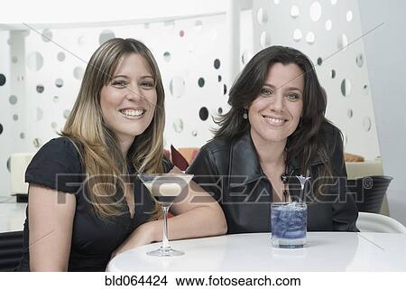 Hispanic friends drinking cocktails View Large Photo Image Picture - Hispanic friends drinking cocktails. Fotosearch