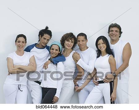 Hispanic friends hugging View Large Photo Image Stock Photo - Hispanic friends hugging. Fotosearch