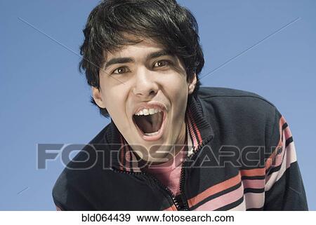 Stock Photo - Hispanic man shouting. Fotosearch