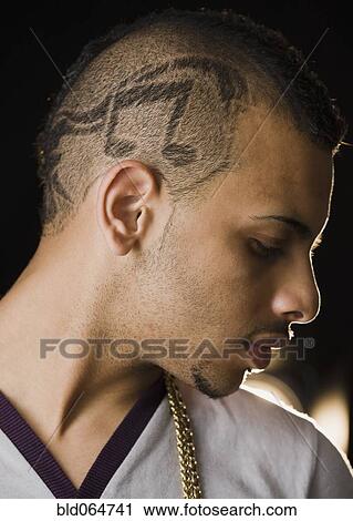 Hispanic teenage boy with musical notes shaved into his head View Large Photo Image Stock Image - Hispanic teenage boy with musical notes shaved into his head. Fotosearch